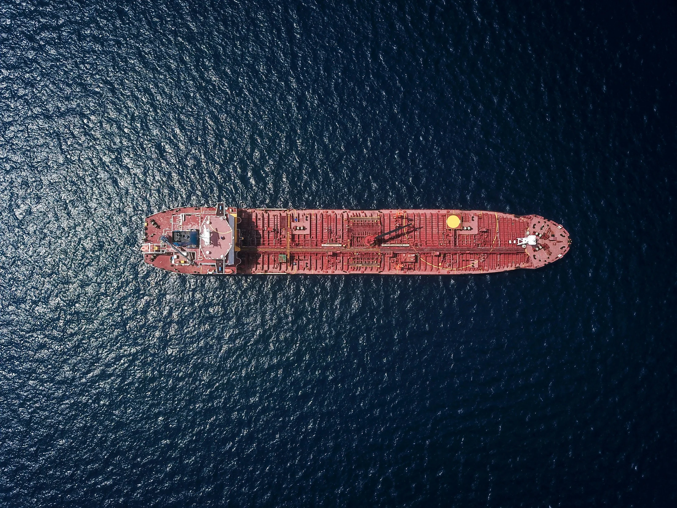 Petroleum tanker moving through deep blue water